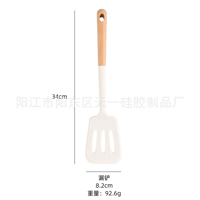 Suministros de cocina Mango de madera de silicona sartén antiadherente europea Espátula de silicona Juego de 10 piezas Juego de utensilios de cocina azul resistente a altas temperaturas