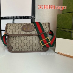 対外貿易の新型の経典の老花の虎の頭の双Gの胸の包みの本革の黒い花の斜めにシングル肩式の女性のカバンにまたがってlogoを持ちます。