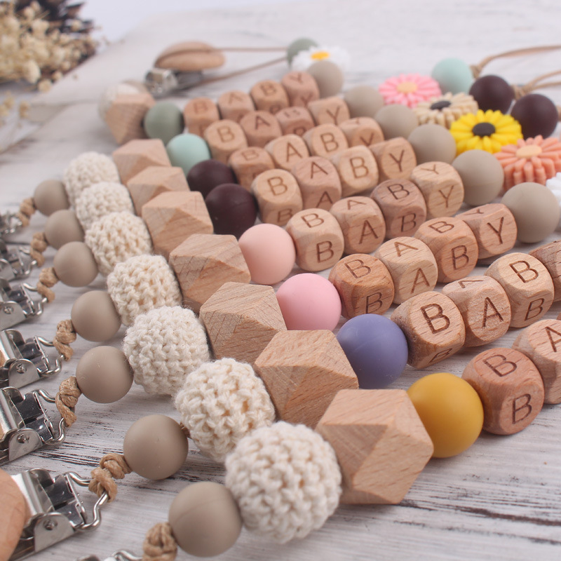 Nuevo bebé dibujos animados Daisy silicona mordedor creativo DIY nombre Cadena de chupete cadena anti-gota