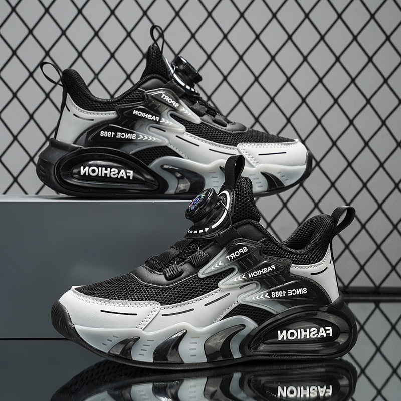 Zapatos de botón giratorio para niños primavera y otoño zapatos de malla transpirables para niños zapatos de corrida de moda universal al por mayor