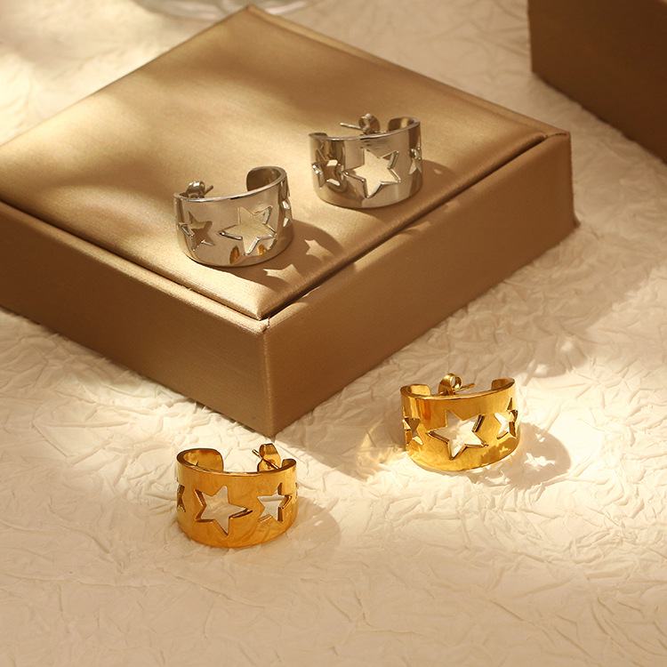 2024 nueva serie europea y americana pendientes de acero inoxidable de 18K estrellas huecas pendientes de anillo curvo diseño personalizado femenino