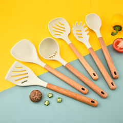 新商品は鍋の調理器具セットの木の柄の食品級のシリカゲルの調理器具の6セットの調理鍋のシャベルをくっつけません。