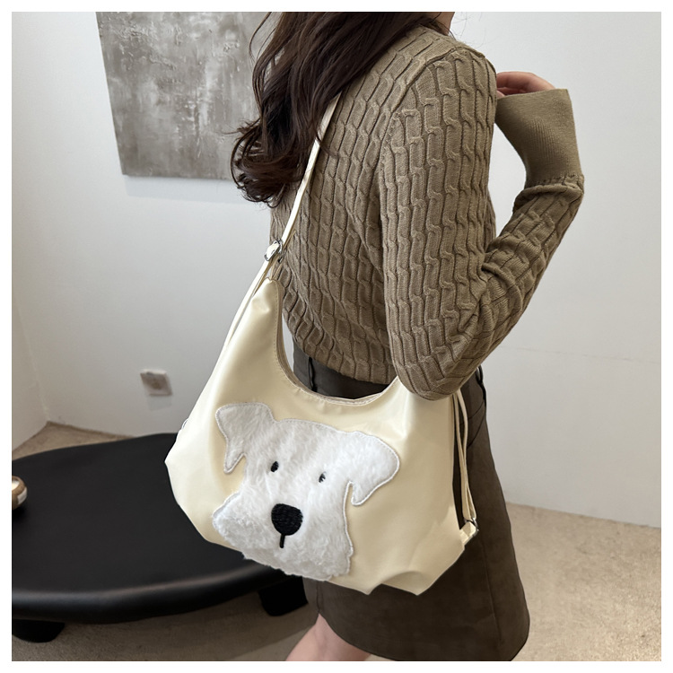 The new autumn and winter 2024 fashion cartoon backpack with simple, individual and niche design, single-shoulder bag and commuter tote bag undefined