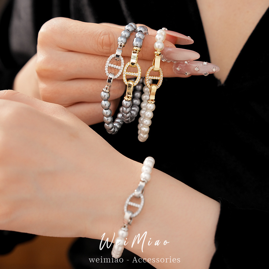 Pulsera de perla de nariz de cerdo de piedra de diamante redonda, pulsera ligera y lujosa, pulsera de nicho, joyas de moda versátiles.