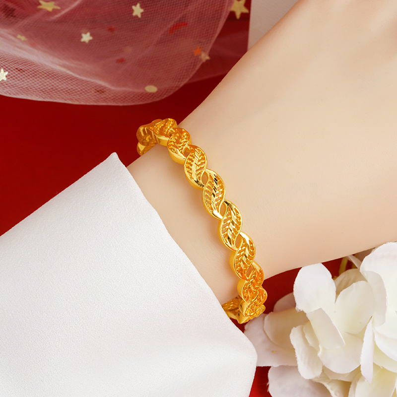 Estilo antiguo arena oro giro bobinado hebilla pulsera de gran altura hojas de aleación de cobre hueco hombres y mujeres pulsera en línea estilo de celebridad