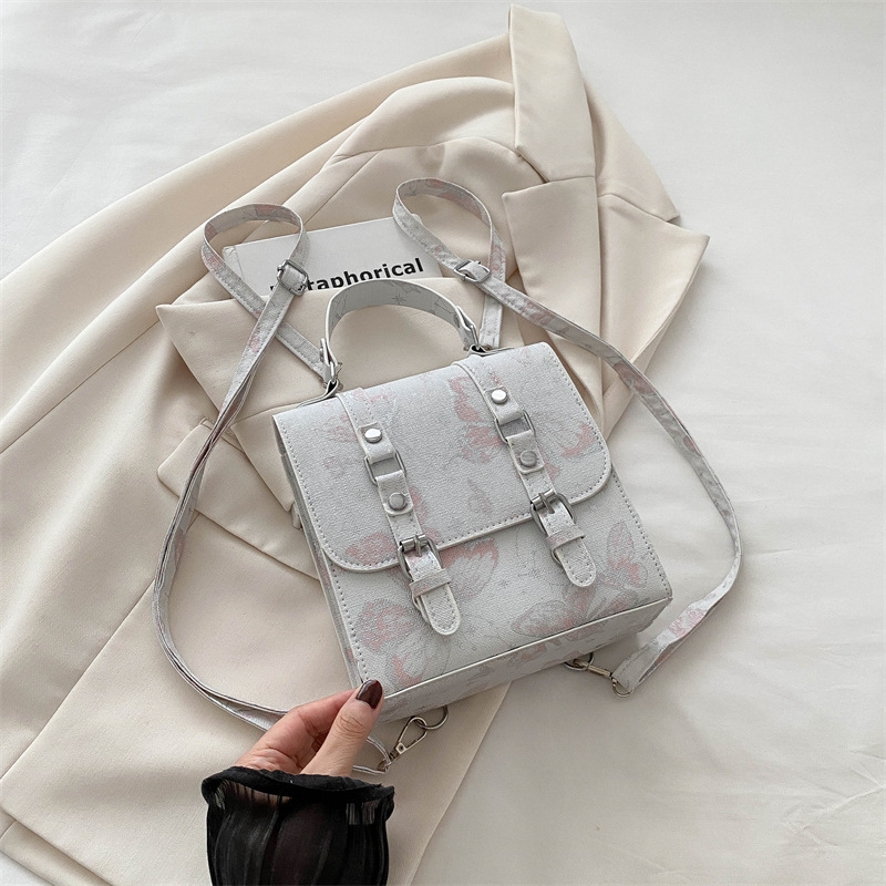 2024 nueva impresión universal mini bolso nuevo estilo chino chino de alto nivel de estilo extranjero nicho mochila mujer