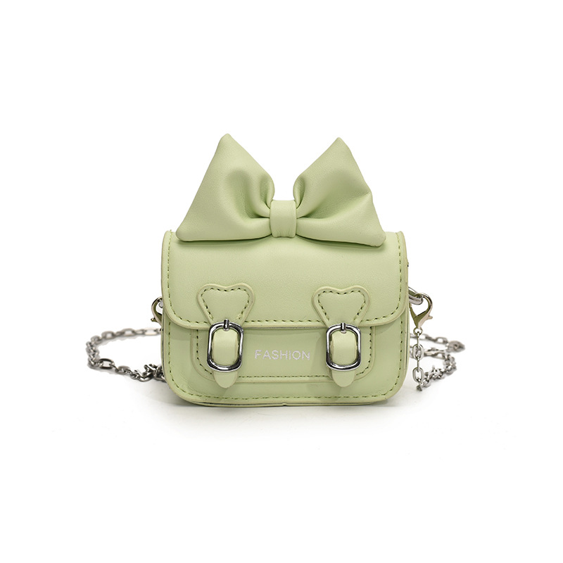 Versión coreana del bolso de hombro para niña con fragancia pequeña, bolso de mensajero para bebé con lazo lindo, bolso para niños con mini cadena de color sólido