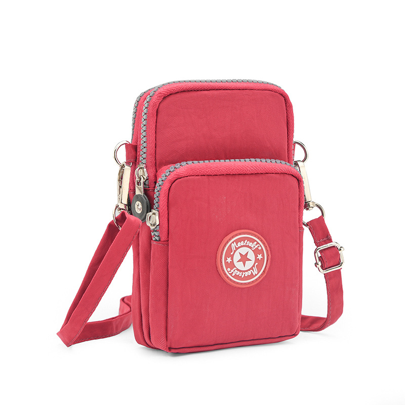 Fábrica directa para bolsos de teléfono móvil bolsos de mujer bolsos de pantalla grande bolsos de cambio bolsos de cuello bolsos de muñeca para correr mini vertical