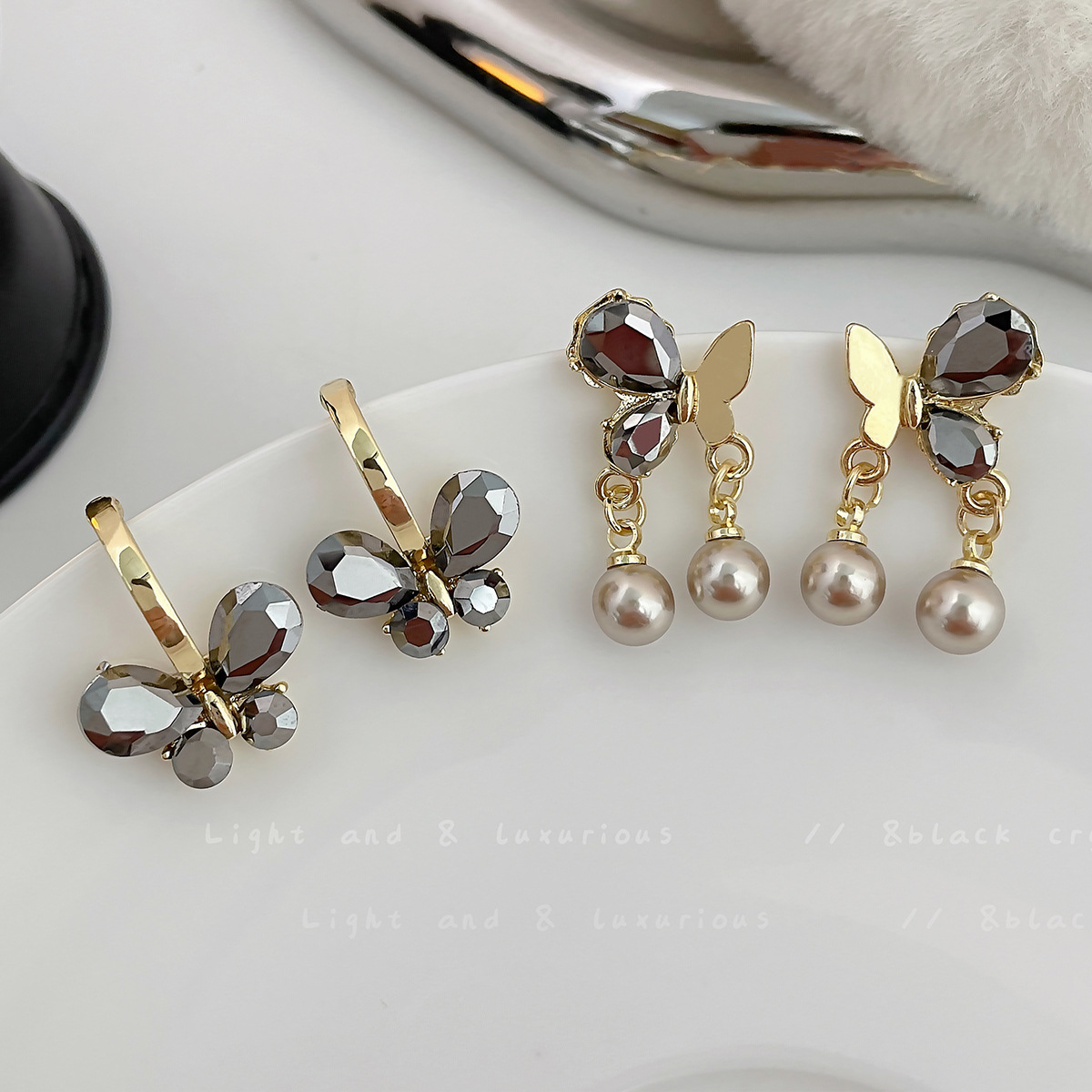 Brincos de borboleta e pérola exclusivos para mulher prata_voghion.com