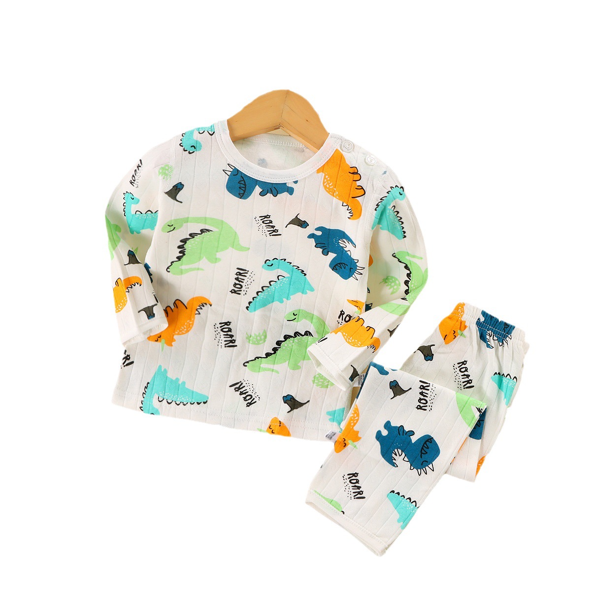 Ropa de casa estilo otoño-invierno para niños mayores, pijamas de algodón puro sin costuras, conjunto de camiseta de manga larga y pantalones, diseño sin costuras.