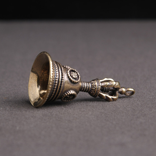 Retro brass Tibetan hand-cranked Vajra bell keychain pendant auspicious wishful copper bell wind chime small copper wholesale