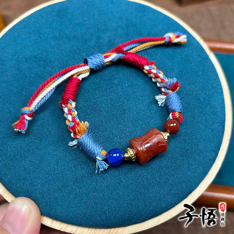 Original design red agate bamboo knot bracelet with intricate carving, Xizang-style hand-woven wristband, Chinese New Year red cord