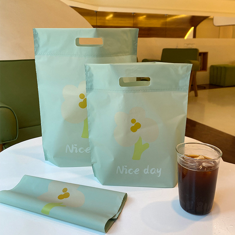 服装店小花薄荷绿磨砂手提塑料袋饰品女装包装购物礼品批发