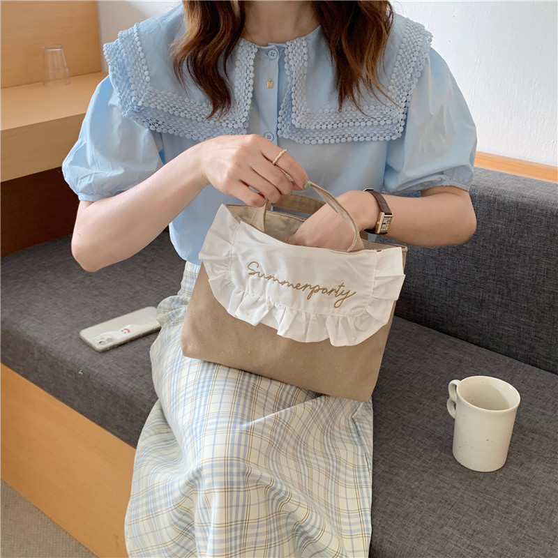 1441 Japanese and Korean chic Sweet ruffled bento Bag, Fresh embroidered hand-held small cloth bag, girl student bag wholesale undefined