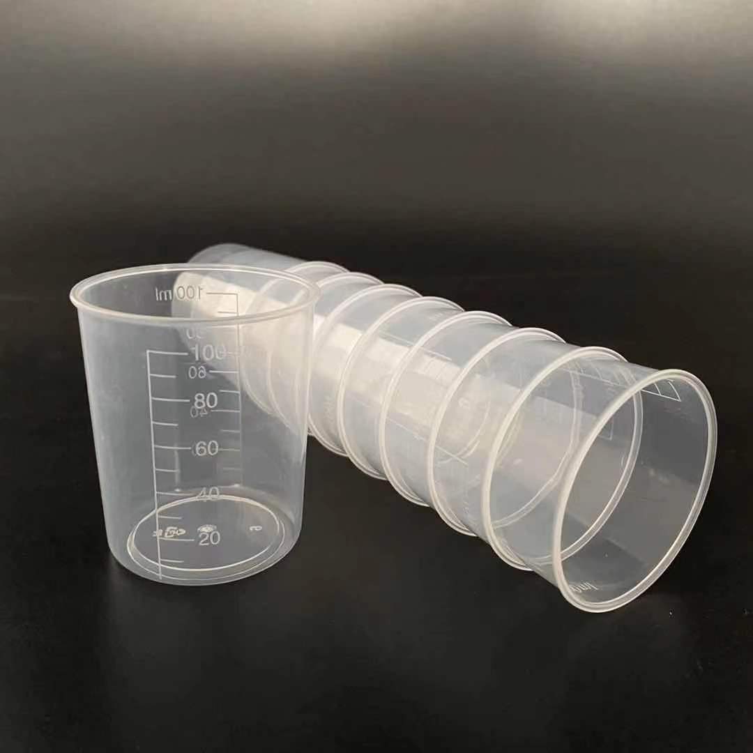 Taza de medición al por mayor 50 ml Taza de medición de plástico 100 ml Taza de precipitados de plástico con taza de plástico graduada