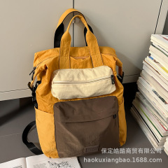撞色双肩包女夏2025新款潮大容量书包女大学生日系原宿风旅行背包