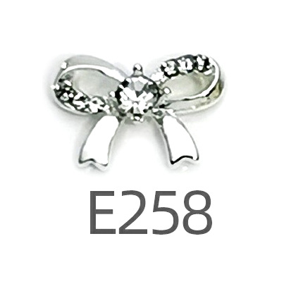 Transfronterizo Japonés arco de uñas accesorios de pajarita caliente simple todo fósforo tridimensional hueco joyería de uñas de diamantes al por mayor