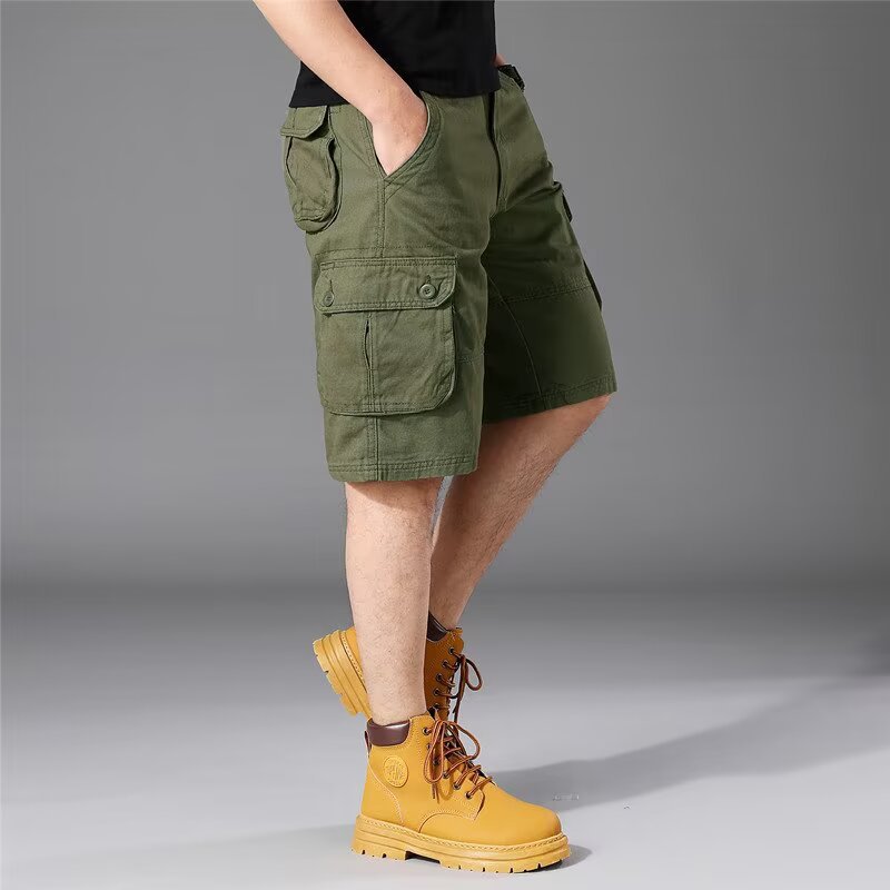 Inventario de verano pantalones cortos sueltos de bolsillo pantalones de herramienta de moda pantalones elásticos de cinco puntos pantalones casuales delgados para hombres