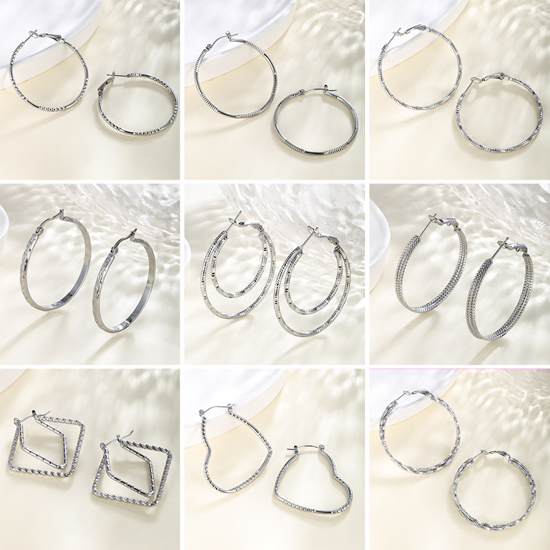Xuping cadena plateada de anillo grande pendientes de nicho de diseño humedad cool auriculares personales ligeras joyas de estilo al por mayor