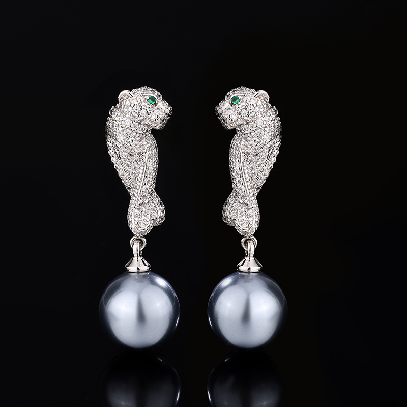 Pendientes de oro blanco con cuentas grises