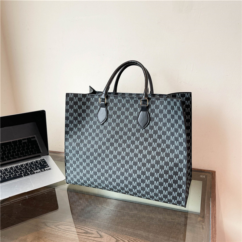 2024 nueva moda simple de gran capacidad impresión retro bolso de mano letras de marea portátil bolsa de mujer de viaje