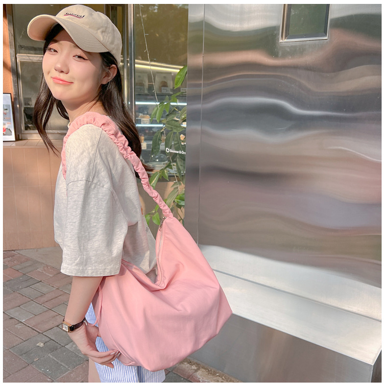 A new large-capacity women's single-shoulder bag with cross-border fashion and simplicity, a fresh and artistic crossbody bag, and a student commuting bag undefined