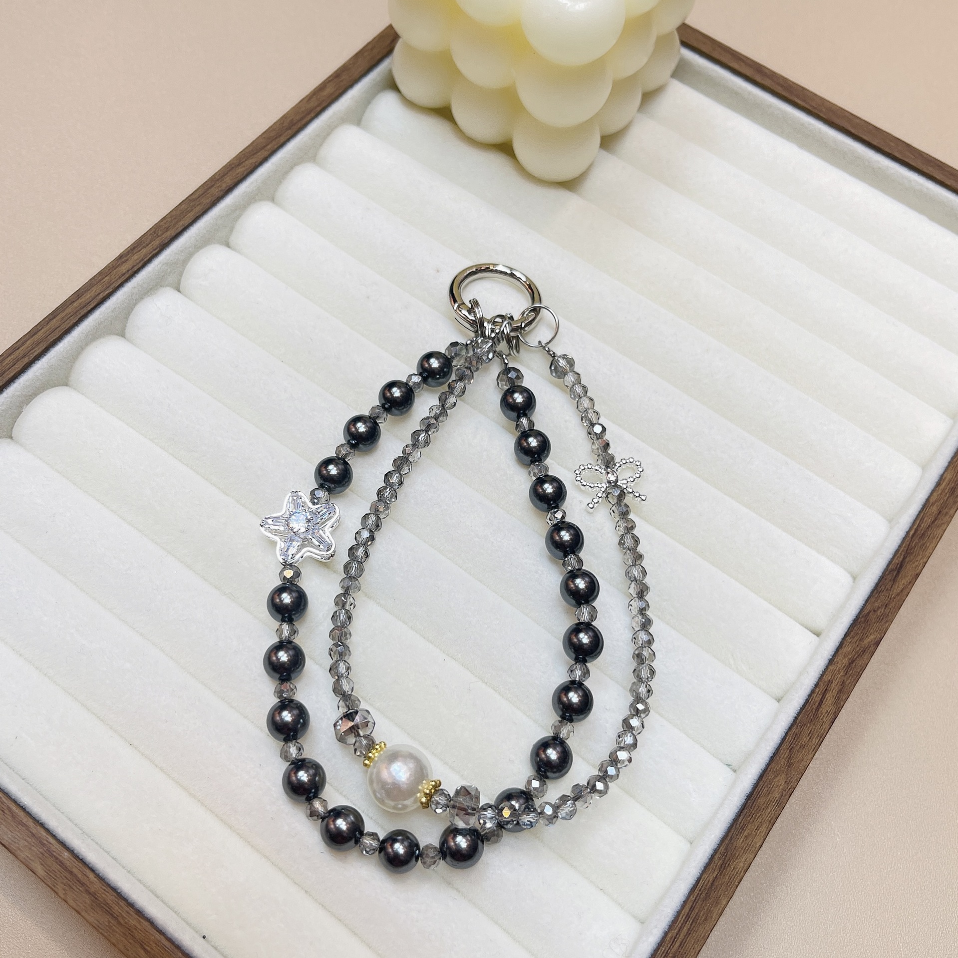 Cordón de teléfono móvil de doble cadena de cristal de moda cordón de muñeca con cuentas de alta gama colgante de estrella llavero de perlas cabello de una pieza