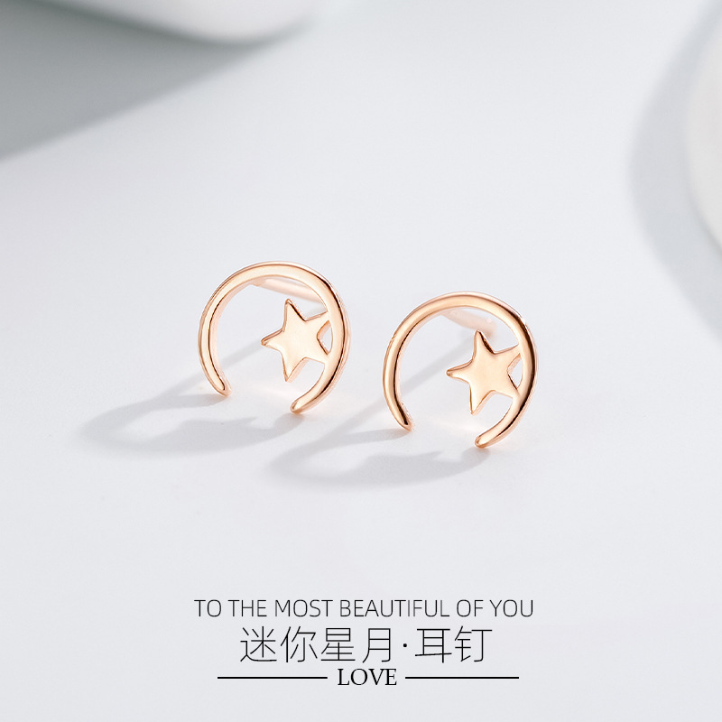 Minimalista estrella Luna Stud pendientes 925 Plata estrella Luna Stud pendientes mujeres simple nicho diseño temperamento oído joyería al por mayor