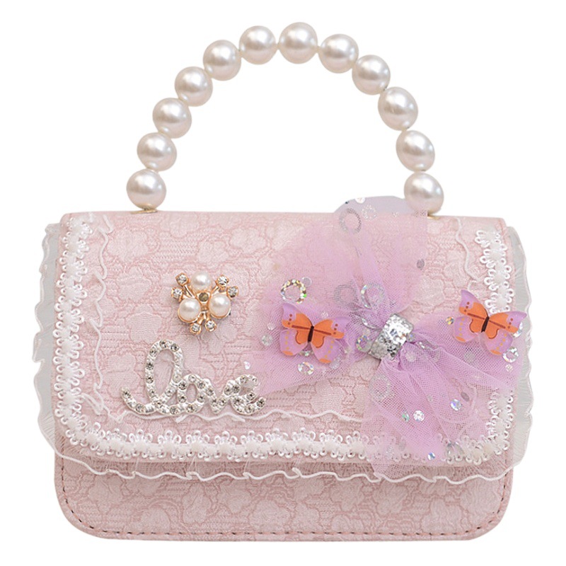 2023 nuevos niños bolsa de mensajero bolsa de moda princesa arco bolso de hombro coreano mini bolso de la cadena de la muchacha