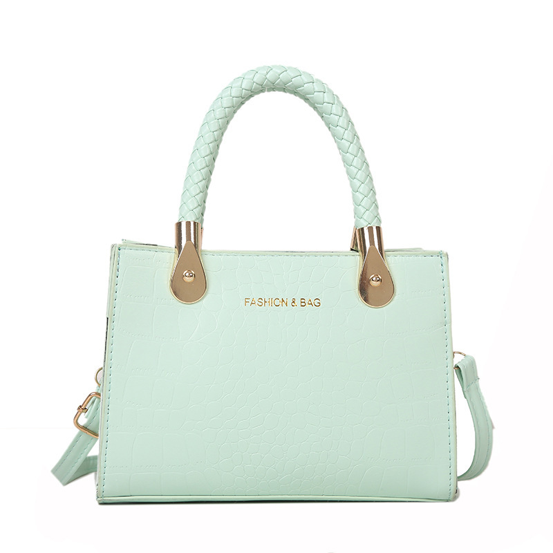 Bolsa de moda con textura para mujer 2024 estilo coreano estilo occidental nuevo color caramelo patrón de piedra bolso tejido bolsa de mensajero