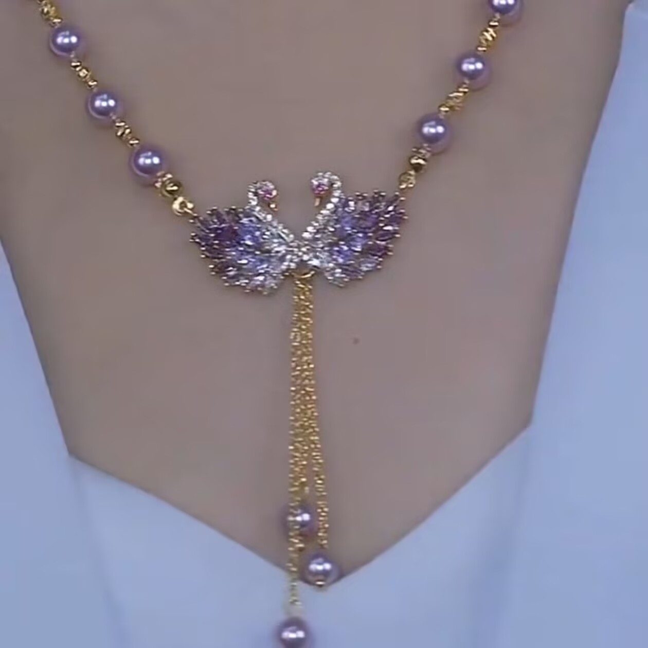复制_新款紫色天鹅流苏珠珠项链女高级感爆款轻奢.jpg