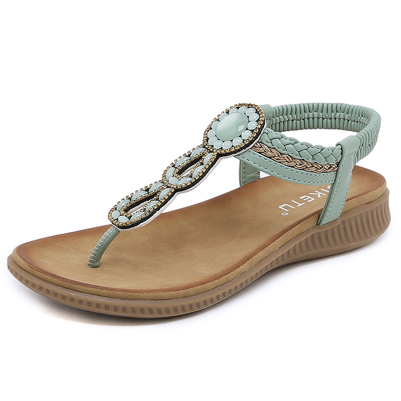 En stock 2024 nuevas sandalias europeas y americanas Bohemia rhinestone cabeza redonda cómoda vacaciones junto al mar más tamaño zapatos planos