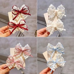 韓国式レースの蝶結びの子供の頭飾りの女の子の気質のレースのヘアピンの重い手作りの高級な髪飾りのヘアピン