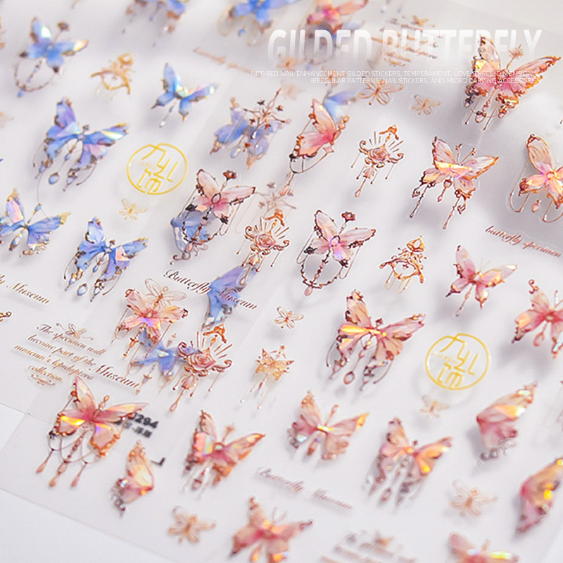 Pegatinas de uñas doradas populares pegatinas de uñas lindas japonesas alivio de fábrica mariposa tridimensional Shell luz Rosa mariposa al por mayor