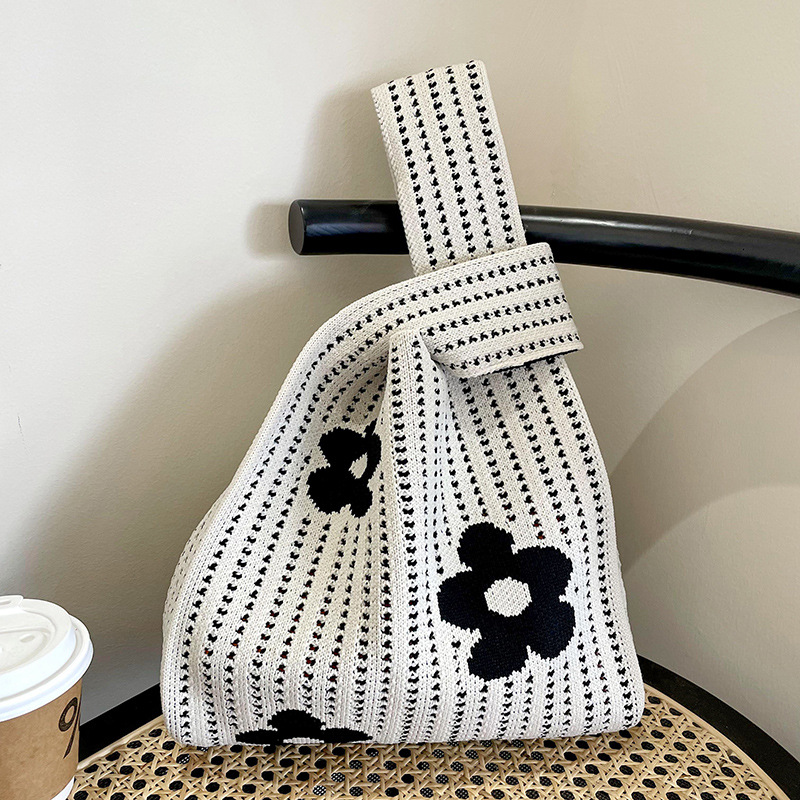 Estilo coreano nicho diseño moda hueco pequeña flor de punto bolso de mano estudiante de gran capacidad bolso de las axilas bolso de las mujeres