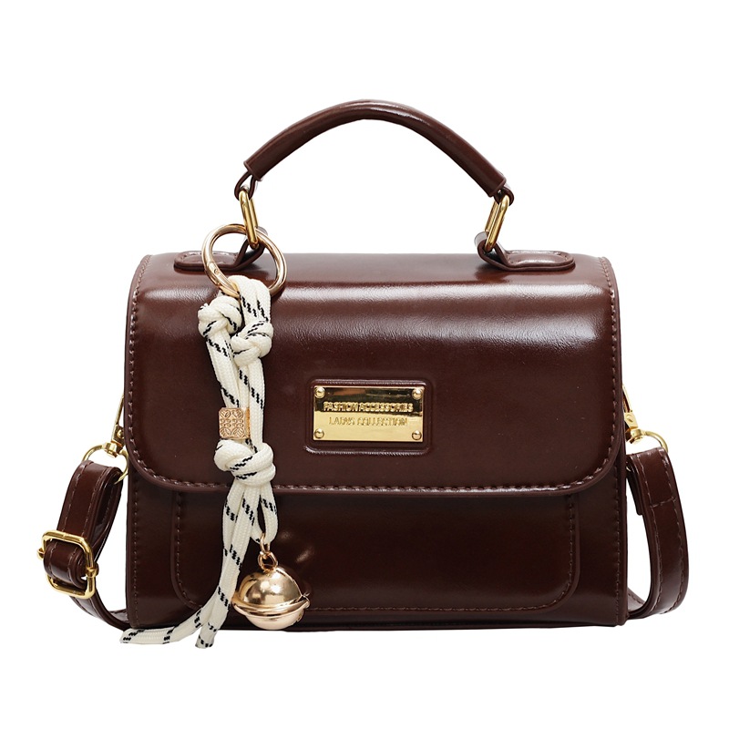 Simple y popular bolso de mano 2025 nuevo estilo de moda retro bolso de hombro coreano alta sensación mochila de mujer