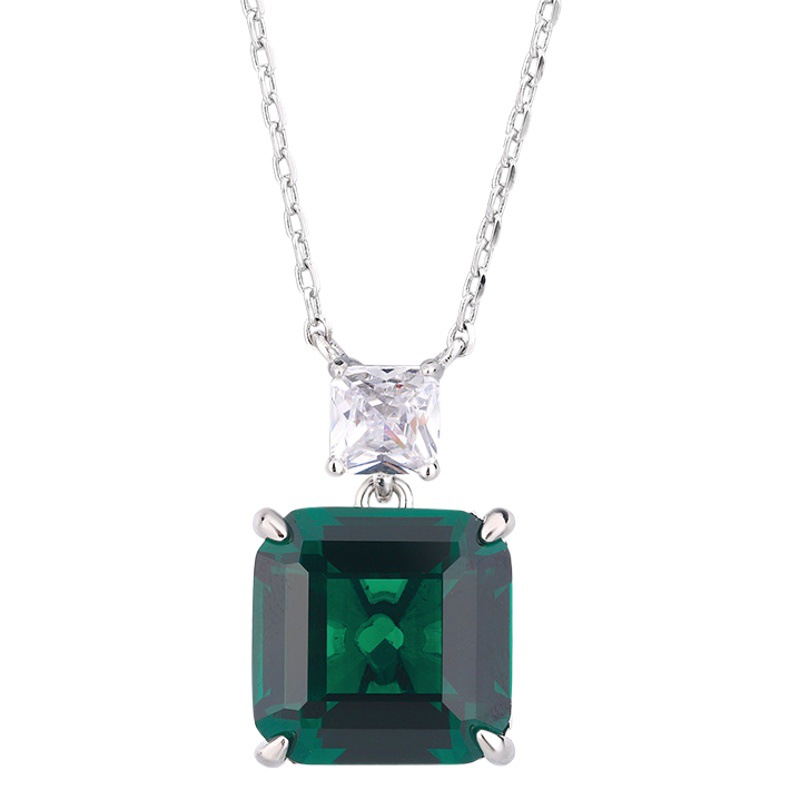 Zhuang Sheng joyería cobre inferior chapado en oro simulación paloma rojo sangre corindón verde nano nicho temperamento traje piedra principal 12*12