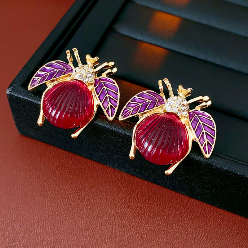 Pendientes de amor con goteo de aceite rojo con aguja de plata, botones de oreja de temperamento de moda de nicho, pendientes simples y de alta gama de estilo de Hong Kong