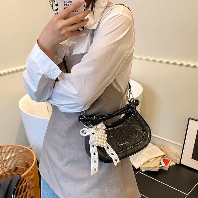 Bolso de nicho francés para mujer 2025 nuevo bolso de hombro casual de todo fósforo de moda bolso de silla de mensajero de estilo occidental