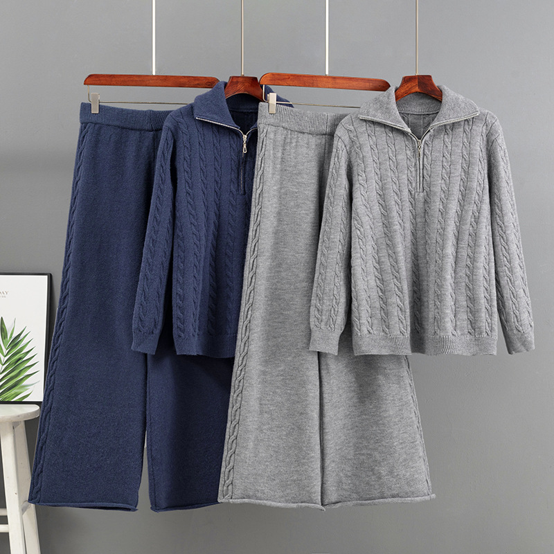 Ensemble pull en maille torsadée épaisse à demi-zip et pantalon large pour femme, collection automne-hiver. Deux pièces de haute qualité, coupe ample._voghion.com