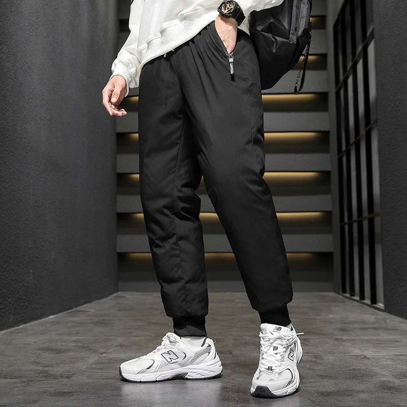 Зимние толстые и ветрозащитные белые утиные пуховые брюки можно открыть