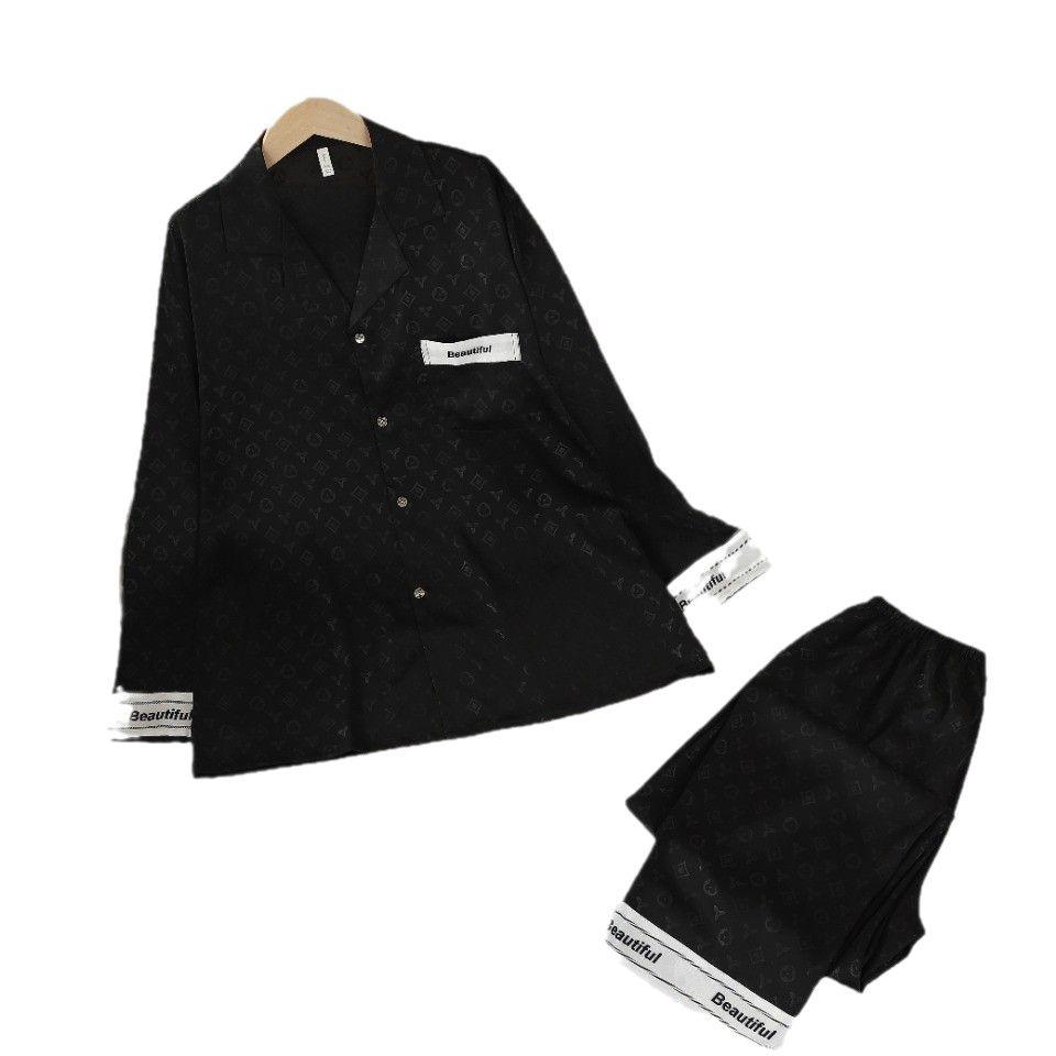 新しい黒いカップルのパジャマの女性春秋氷糸長袖はシルクの夏の家の服の大きいブランドの男性のスーツをシミュレーションします。