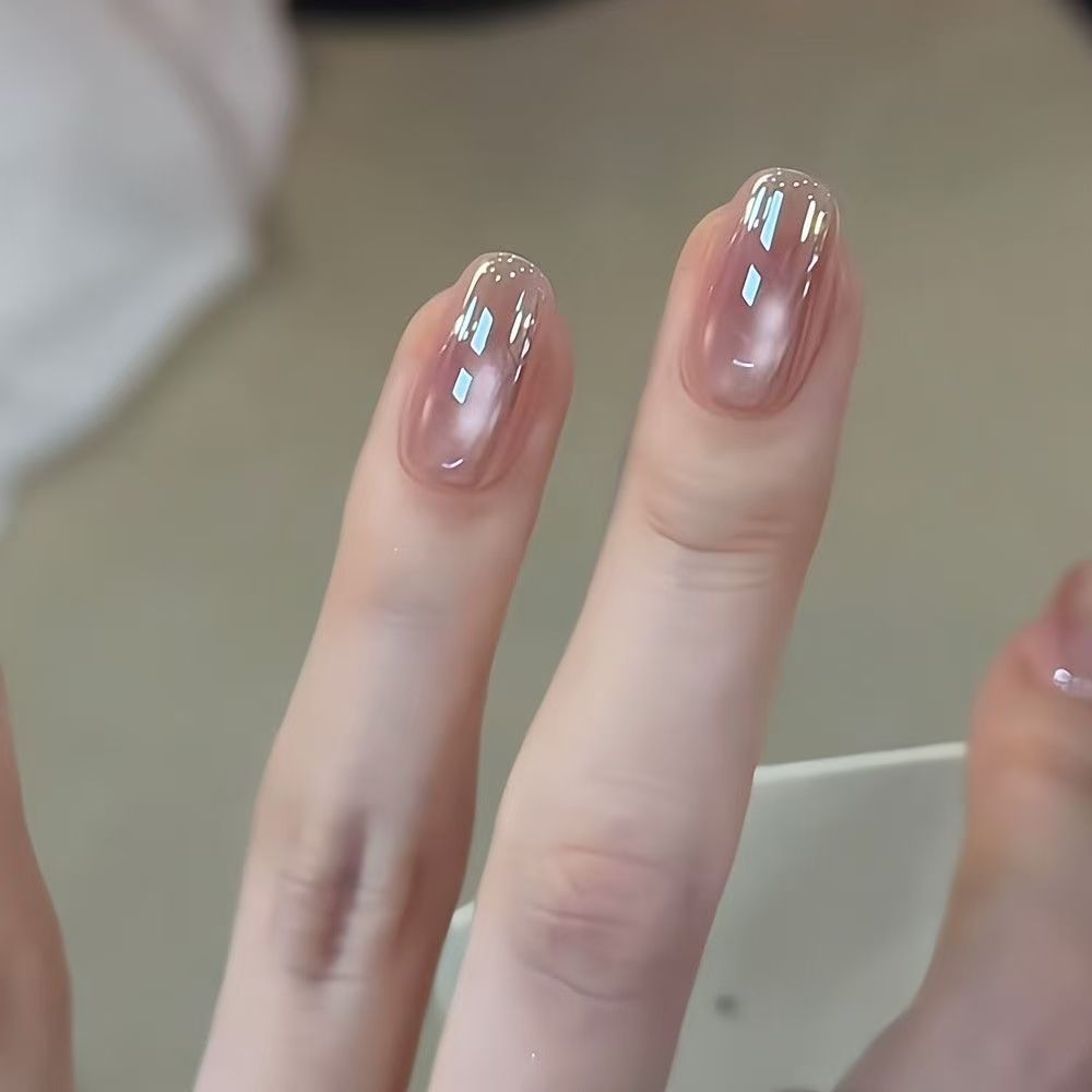Uñas postizas francesas con diseño floral dorado, estilo ojo de gato, cortas y desmontables, producto de alta gama para arte de uñas 2026.