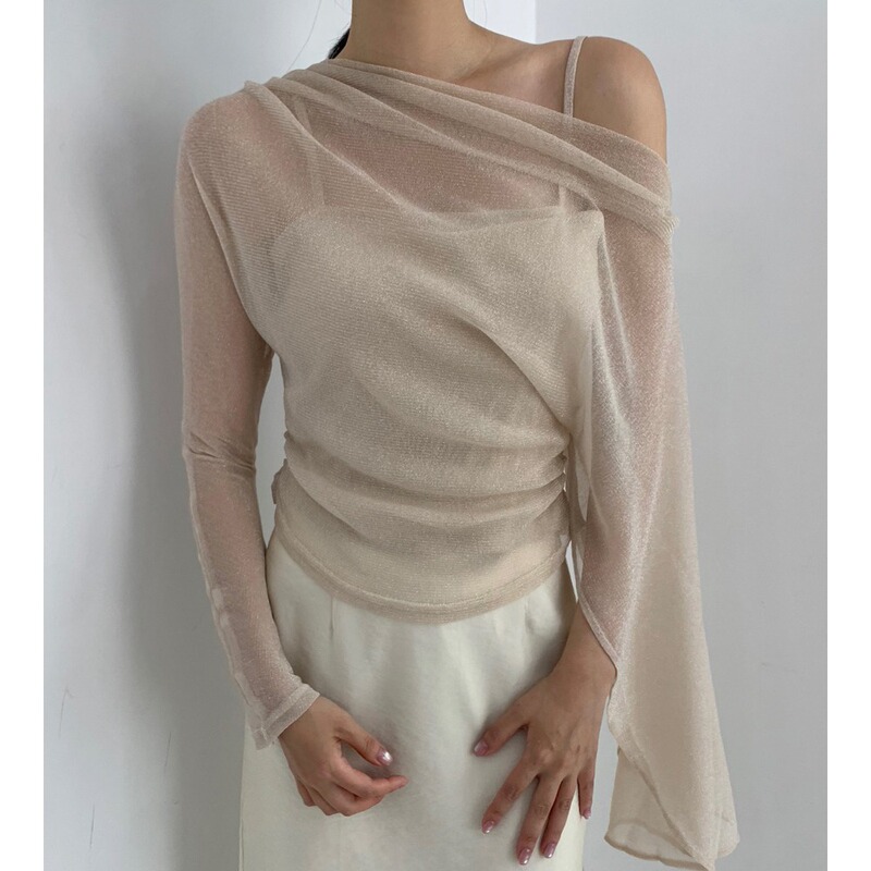 Early autumn new collection: a gentle, off-the-shoulder, two-piece top for women, featuring shimmering tulle, pleated detailing, a fitted waist, and a shawl-style blouse Early autumn new collection: a gentle, off-the-shoulder, two-piece top for women, featuring shimmering tulle, pleated detailing, a fitted waist, and a shawl-style blouse