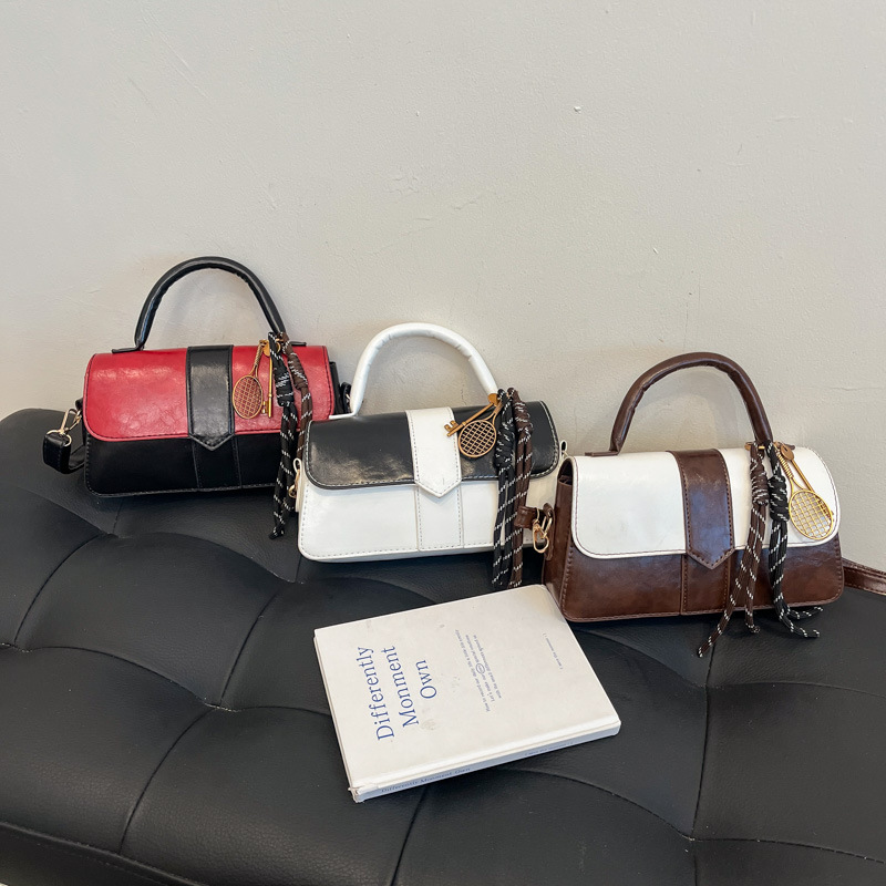 Este año, bolsos populares de color contrastante para mujeres 2025, nuevos bolsos de mano de moda, bolsos cuadrados, bolsos de nicho literario.