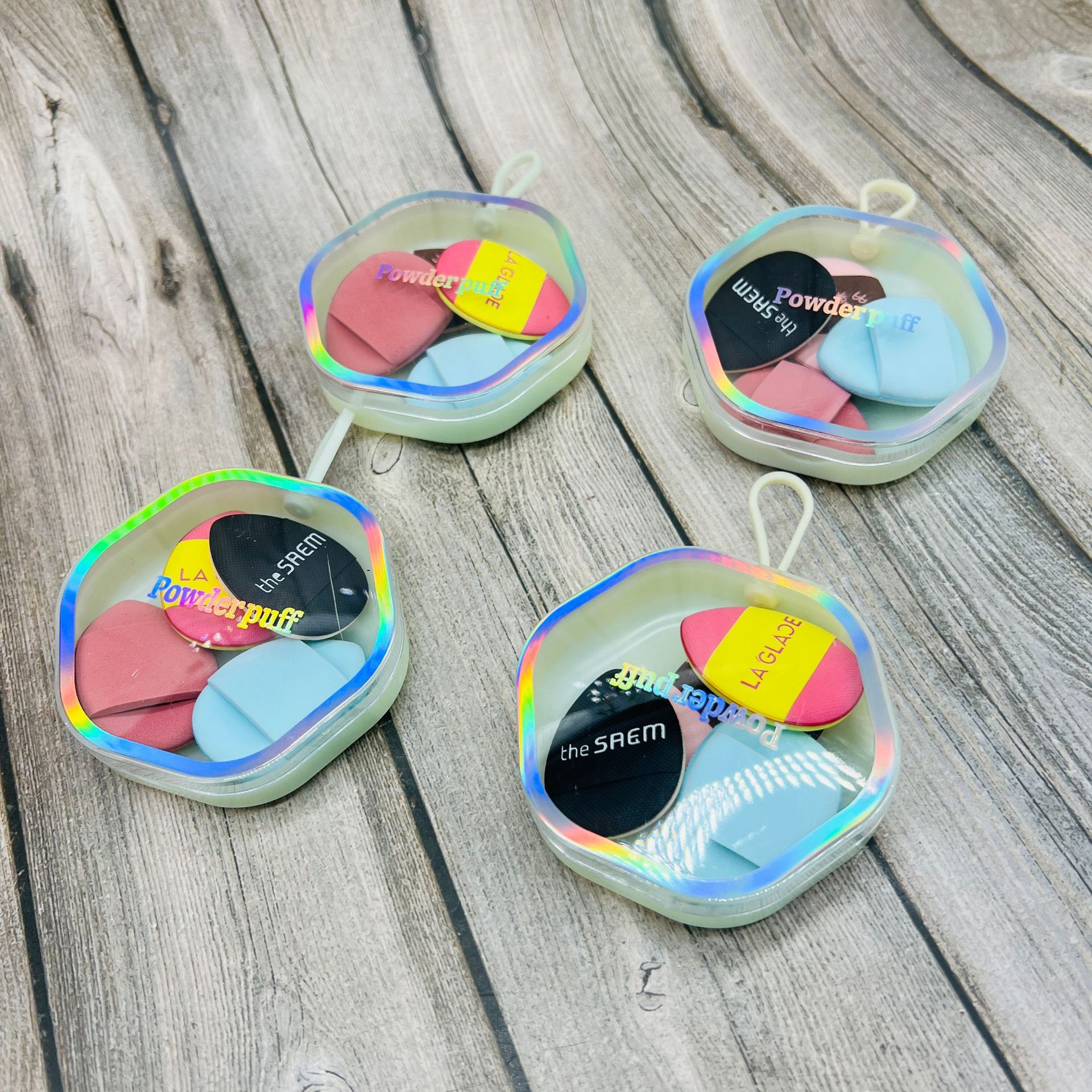 Pink powder puff dos yuanes tienda de suministro de papel independiente tarjeta de embalaje belleza húmeda y seca de doble uso polvo rosa calidad simple y bajo precio