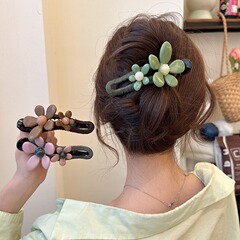 ファッションの花のカードの1字の髪飾りの高級感のアヒルの口は女性の後頭部を挟んで神器の2025新型の頭飾りを出します。