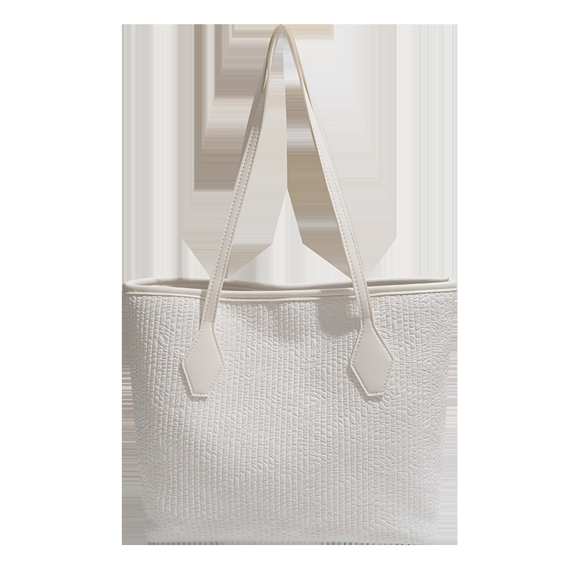 Bolsa de gran capacidad para mujeres 2026 nuevo estilo extranjero tejido de hombro brazo bolso de mano para salir bolsa de viaje