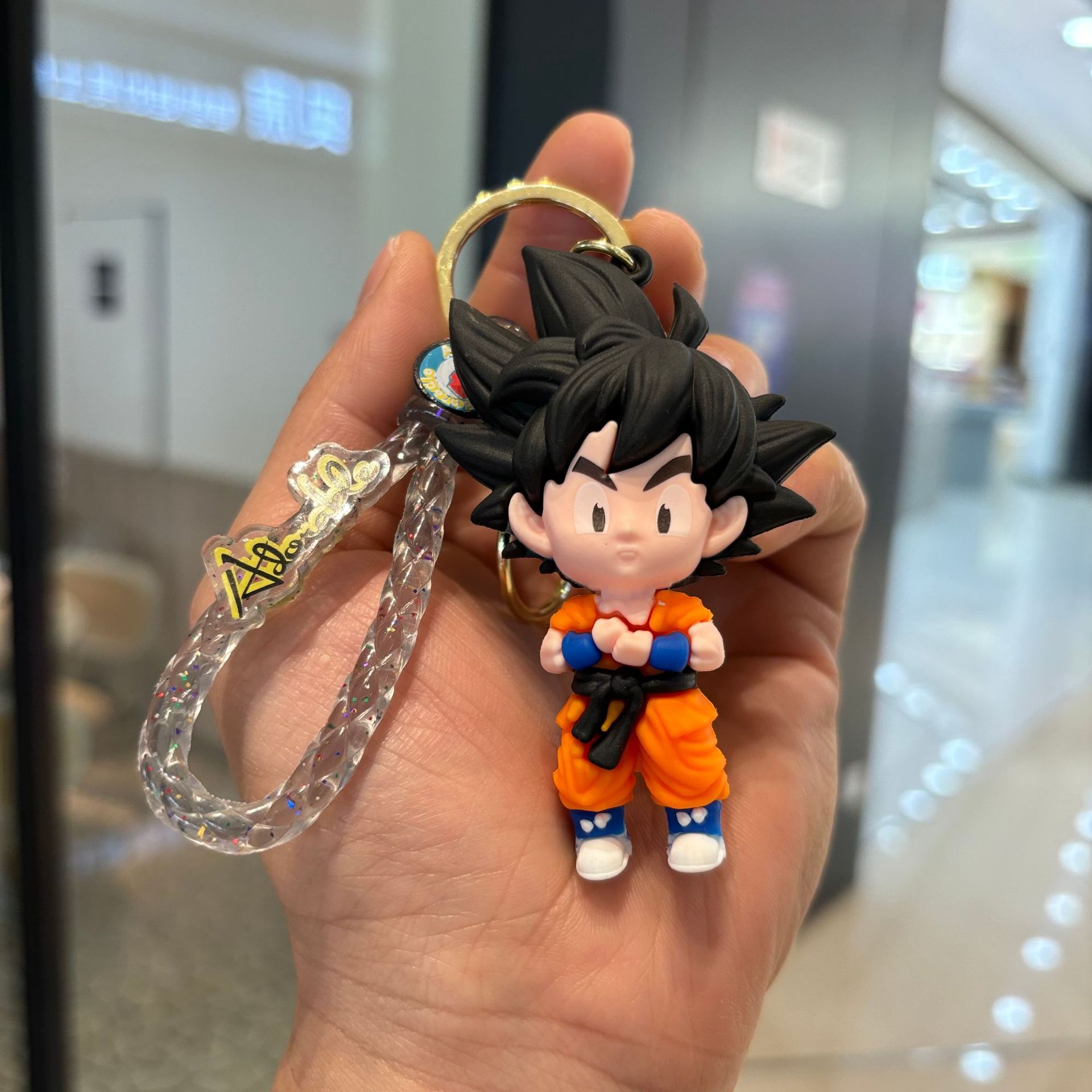 Cartoon Seven Dragon Ball Wukong llavero Cool Sun Wukong muñeca colgante agarrar máquina de regalo pequeño llavero al por mayor