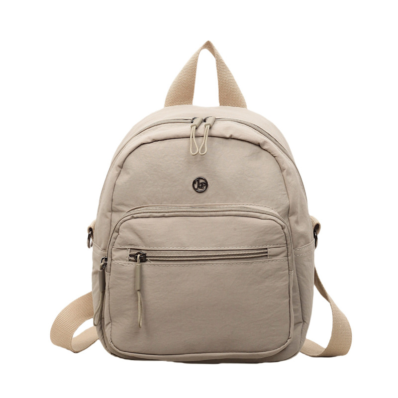 Mini mochila ligera coreana de moda casual mochila de viaje al aire libre de viaje de viaje simple mochila de estudiantes